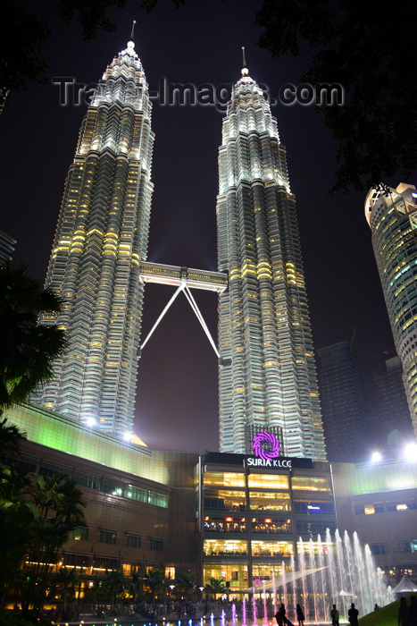 mal368: Kuala Lumpur, Malaysia: Petronas Towers and Suria KLCC shopping mall at night, from KLCC Park - designed by Cesar Pelli and inaugurated in 1998 - photo by M.Torres - (c) Travel-Images.com - Stock Photography agency - Image Bank
