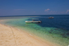 Sipadan Island, Sabah, Borneo, Malaysia: diveboat moored on the white sandy beach - photo by S.Egeberg