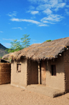 Cape Maclear / Chembe, Malawi: mud brick house with thatched roof - built on the beach sand - photo by M.Torres