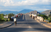 Mangochi, Malawi: people cross the Bakili Muluzi bridge, named after the President of Malawi from 1994 to 2004 - former Fort Johnston - photo by M.Torres