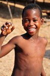 Cape Maclear / Chembe, Malawi: boy on the beach - Yao peole, the Wayao ethnic group, speakers of a Bantu language known as Chiyao - Nankumba Peninsula - photo by M.Torres