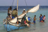 Maldives local natives disembarking from a boat (photo by B.Cain)