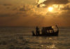 Maldives Sunset with dhoni from Kuda Huraa (photo by B.Cain)