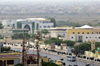 Nouakchott, Mauritania:Abdel Nasser Avenue with the Army HQ on the left and the Accounting School on the left - seen from above - traffic and people - photo by M.Torres