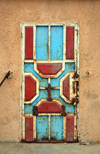 Nouakchott, Mauritania: rusty metal door with padlocks - fishing harbor complex - photo by M.Torres