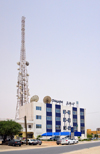 Nouakchott, Mauritania: large telecom antenna and the offices of Chinguitel,a  telecoms operator - photo by M.Torres