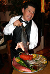 San Miguel de Allende (Guanajuato): waiter showing the fish -  El Campanario Restaurant (photo by R.Ziff)