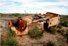 Mexico - Bahia De Los Angeles (Baja California): abandoned car rusting in the desert - rollover accident by G.Friedman