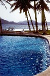 Mexico - Manzanillo / ZLO (Colima): pool, palms and bay (photo by Terry Prosser)