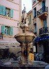 Monaco-Ville: fountain on St Nicolas square (patron of sailors and fishermen) by U.Bassignami - fontaine au centre de la place St. Nicholas (photo by M.Torres)