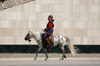Ulan Bator / Ulaanbaatar, Mongolia: a soldier on his horse, Sukhbaatar square - photo by A.Ferrari