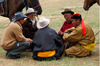 Ulan Bator / Ulaanbaatar, Mongolia: Naadam festival - men talking about the horse race - photo by A.Ferrari