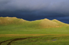 Khorgo-Terkhiin Tsagaan Nuur NP, Arkhangai Province, Mongolia: hills in the evening light - photo by A.Ferrari