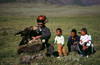 Mongolia - Altai: Kazak eagle hunter and family - photo by A.Summers