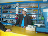Mongolia - Burgun, Bayan-lgiy Aymag: shopkeeper - woman - photo by P.Artus