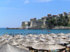 Montenegro - Crna Gora - Ulcinj / Dulcigno / Ulqin: fortress where Miguel de Cervantes was held hostage and beach umbrellas - photo by J.Kaman - photo by J.Kaman