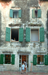 Montenegro - Crna Gora - Kotor: faade - residential building - green shutters - photo by J.Banks
