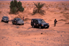 Morocco / Maroc - Merzouga: 4WD caravan in the desert - photo by F.Rigaud