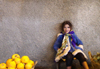 Morocco / Maroc - Fez: girl selling fruit - photo by J.Kaman