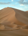 Morocco / Maroc - Erg Chebbi: scale - dune and man - desert - photo by J.Banks