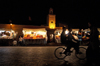 Morocco - Marrakech: Place Djemaa el Fna - night - minaret and bike - photo by M.Ricci
