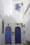 Asilah / Arzila, Morocco - blue doors on whitewashed houses - photo by Sandia
