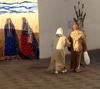 Asilah / Arzila, Morocco - real and fictional local women strolling the streets of the medina - photo by Sandia