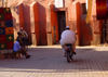 Marrakesh - Morocco: street scene - bike and baloon - photo by Sandia
