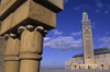 Casablanca, Morocco: detail of pillars and Hassan II mosque in the background- photo by S.Dona'