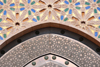 Casablanca, Morocco: Hassan II mosque - dazzlingly intricate decoration above a gate - photo by M.Torres