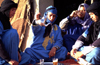 Morocco / Maroc - Merzouga: Berbers having tea - photo by F.Rigaud