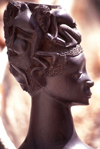 Pemba / Porto Amlia, Cabo Delgado, Mozambique / Moambique: wooden bust - woman with men on her head - Makonde art / escultura Maconde - busto - photo by F.Rigaud
