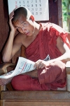 Myanmar / Burma - Inle Lake: monk reading the Myanmar Times (photo by J.Kaman)
