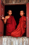 Myanmar - Kalaw - Shan State: two novice monks at a window - people - Asia - photo by W.Allgwer