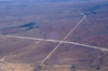 Namibia: Aerial View of twointersecting roads - photo by B.Cain