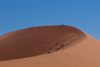 Namib Desert - Sossusvlei, Hardap region, Namibia, Africa: Two Hikers on Big Mama sand dune - photo by B.Cain