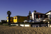 Swakopmund, Erongo region, Namibia: houses on the waterfront - central beach - German colonial architecture - photo by Sandia