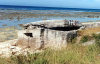 Nauru / INU: rocky beach with Japanese WWII pillbox - photo by G.Frysinger