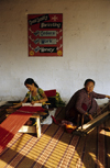 Nepal - Pokhara: weavers and quality motivation poster - Women Handicraft Center - women's movement - photo by W.Allgwer