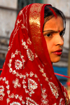 Kathmandu, Nepal: young woman in red sari and tilaka on the forehead - photo by J.Pemberton