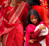 Kathmandu, Nepal: woman and daughter at Teej, the Hindu women's festival, celebrated for marital felicity, well-being of family and purgation of own body and soul - photo by J.Pemberton
