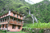 Tal, Annapurna region, Gandaki Zone, Nepal: waterfalls and Paradise hotel - Annapurna Circuit Trek - photo by M.Wright
