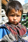 Annapurna region, Nepal: girl with sad eyes - photo by M.Wright