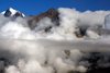 Annapurna region, Nepal: peaks submerged in clouds - view form Jharkot, Mustang district - photo by M.Wright