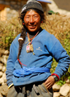 Namche Bazaar, Khumbu region, Solukhumbu district, Sagarmatha zone, Nepal: typical tibetan guy at the market - photo by E.Petitalot