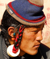 Khumbu region, Solukhumbu district, Sagarmatha zone, Nepal: typical Tibetan hairstyle - photo by E.Petitalot