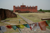 Lumbini, Kapilavastu district, Nepal: Buddhist pilgrimage site - birthplace of Buddha - prayer flags and Maya Devi temple - photo by G.Koelman