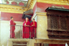 Nepal - Kathmandu: Swayambhunath - monkey temple - monks-in-training on a balcony (photo by G.Friedman)