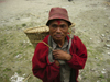 Tipylang, Myagdi District, Dhawalagiri Zone, Nepal: man with bamboo basket - dhoko - Annapurna Circuit - photo by M.Samper