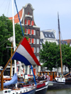 Netherlands - South Holland - Dordrecht - flag and faades - Wolwevers harbor - photo by M.Bergsma